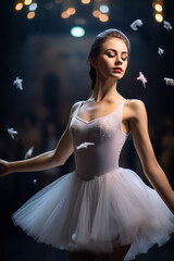 Graceful, attractive young ballerina making performance, dancing on stage