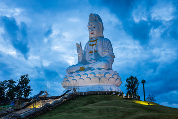 Large statue of Kuan Yin at Huai Pla Kang Temple, Chiang Rai, Thailand - obrazy, fototapety, plakaty