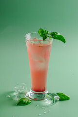 Fresh pink cocktail on a bright background