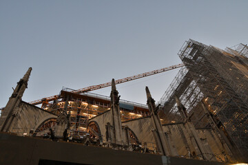 Fototapeta na wymiar Paris, France. Notre Dame Cathedral under reconstruction at dusk. November 13, 2022.