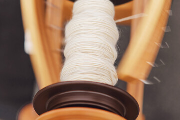 The old spinning wheel with its intricate design is a popular choice for hobbyists and craft...