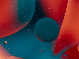 abstract background oil drops on water macro orange