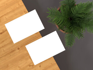 blank paper on the business card with a wooden background