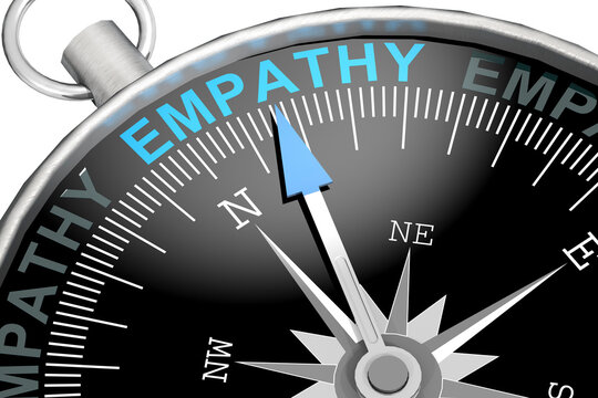 Empathy word on black compass