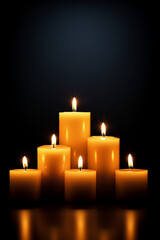 Group of four candle lights, with dark background, with space for text