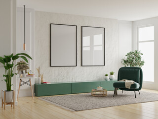 Mockup frame in interior background with green armchair and decor in living room