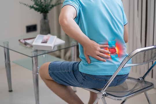 Lumbar intervertebral spine hernia, man with back pain at home, spinal disc disease