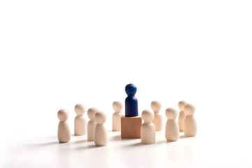Unique toy figure in front of others. Concept of business leadership for team.