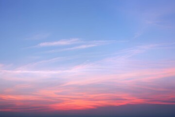 Naklejka na ściany i meble パステルピンクとブルーの空、オレンジとピンクがかった穏やかな夕暮れ、柔らかな色合いの空と優しい雲、サンセットカラーがほんのりと香る穏やかな空