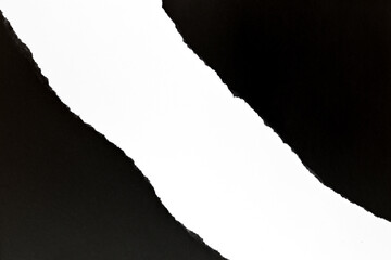 Torn paper on a black background