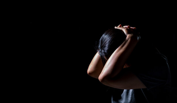 Stop Sexual abuse Concept, stop violence against Women, international women's day. Female stress with fear and depression from sexual abuse. Human crying depression from being a victim of crime.
