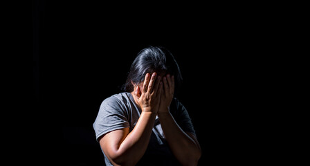 Stop Sexual abuse Concept, stop violence against Women, international women's day. Female stress with fear and depression from sexual abuse. Human crying depression from being a victim of crime.