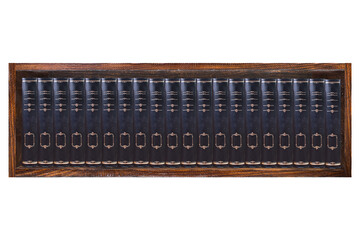 Empty, dark, wooden bookshelf isolated on a white background.