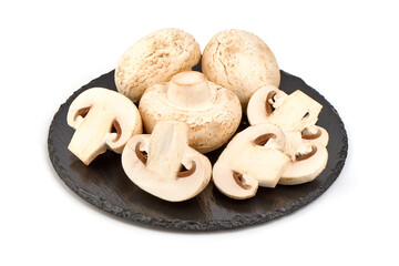 Champignon mushrooms, isolated on white background.
