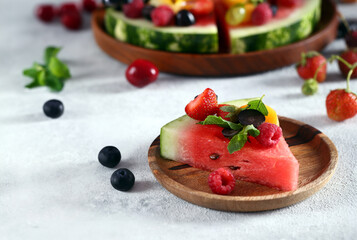 fruit pizza from watermelon with fresh berries