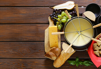 cheese fondue with fresh bread and fruit