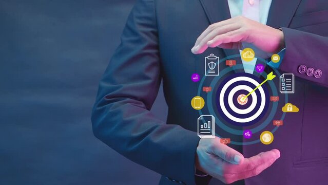 business man is handle arrow bow put on middle pad explain for archive target for online communication.