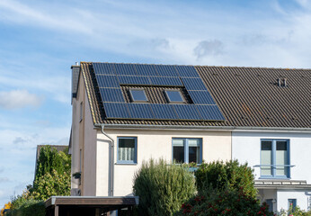 house with solar panels on the roof 