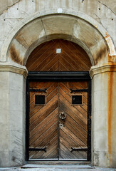 old weathered wooden door of old Lindsay Jail. Lindsay Ontario