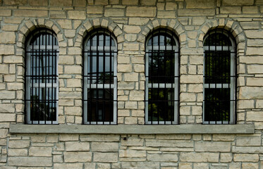 Fototapeta na wymiar Outside windows and bars of Old Lindsay Jail Lindsay Ontario