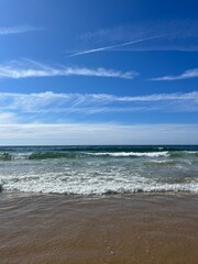 Fototapeta na wymiar Blue sea horizon, ocean bay, blue sky, sandy coast