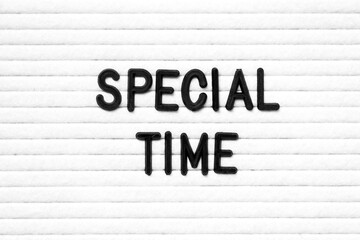 Black color letter in word special time on white felt board background