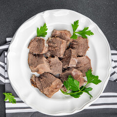pork tongue cooked meat fresh delicious healthy eating cooking appetizer meal food snack on the table copy space food background rustic top view keto or paleo diet