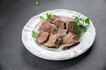 pork tongue cooked meat fresh delicious healthy eating cooking appetizer meal food snack on the table copy space food background rustic top view keto or paleo diet