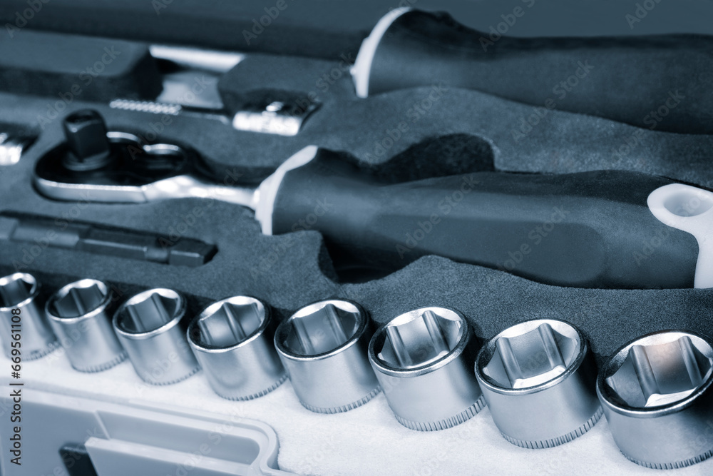 Poster Hardware toolkit with many different garage equipment. Automobile fix background. Screwdriver metal bits set