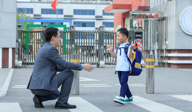 Father and son at the school gate