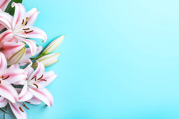 Obraz premium Floral Background With Copy Space, Pink Lilies on a blue background
