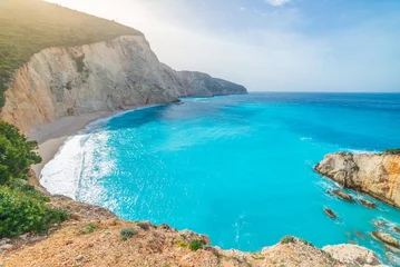 Fotobehang Turquoise Beautiful beach and water bay in the greek spectacular coast line. Turquoise blue transparent water, unique rocky cliffs, Greece summer top travel destination Lefkada island