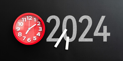 Number 2024 with clock on the blackboard