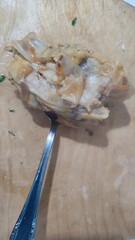 boiled chicken fillet on a tablespoon, food