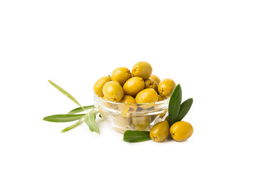 Delicious green olives isolated on white background. Olive and olive tree branches on a white...