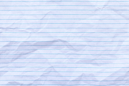Top view empty rumpled lined paper with wrinkled. Notebook lined paper background and texture.