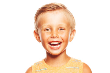 Happy childhood concept. Close up of pretty little boy with blond hair laughing isolated on white background. Studio shot