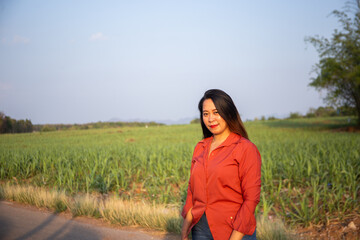 women asian standing on the countryside road