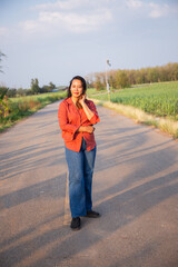 women asian standing on the countryside road