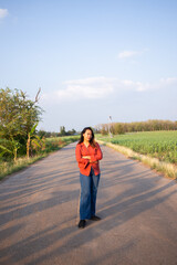 women asian standing on the countryside road