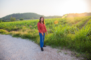 women asian standing on the countryside road