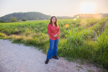 women asian standing on the countryside road
