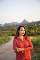 women asian standing on the countryside road