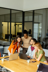 Young multiethnic startup team working in the modern office