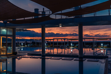 swimming pool against the backdrop of a beautiful evening sky near the Mediterranean coast 1