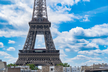 Fototapeta na wymiar famous Eiffel Tower landmark and Paris old roofs close up, Paris France