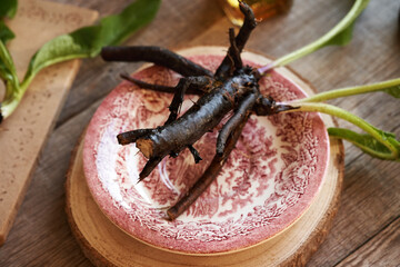 Fresh comfrey root on a table