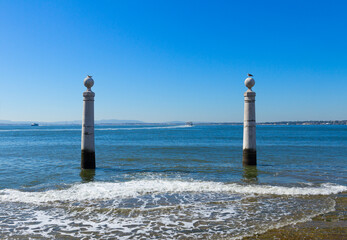 two posts at the embankment of Lisbon, favotire tourists place for making selfie photo, Portugal