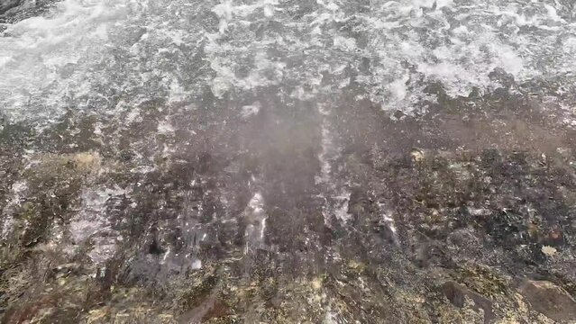 Clear flowing water close up.