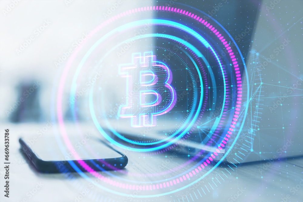 Poster close up of laptop and tablet with glowing round polygonal bitcoin hologram on blurry background. on